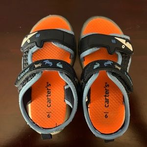 Carter’s Toddler boys light-up sandals.